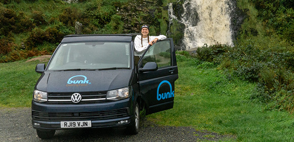 Nomad Camper beside a waterfall in Ireland