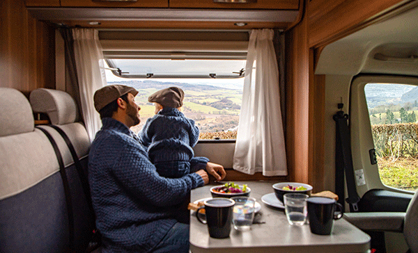 A family enjoying their Scenic drive in a motorhome