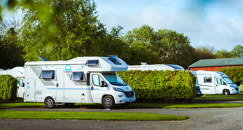 Bunk Campers Motorhome Parked at a Campsite